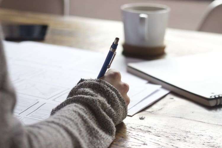 womanworkingwithpen